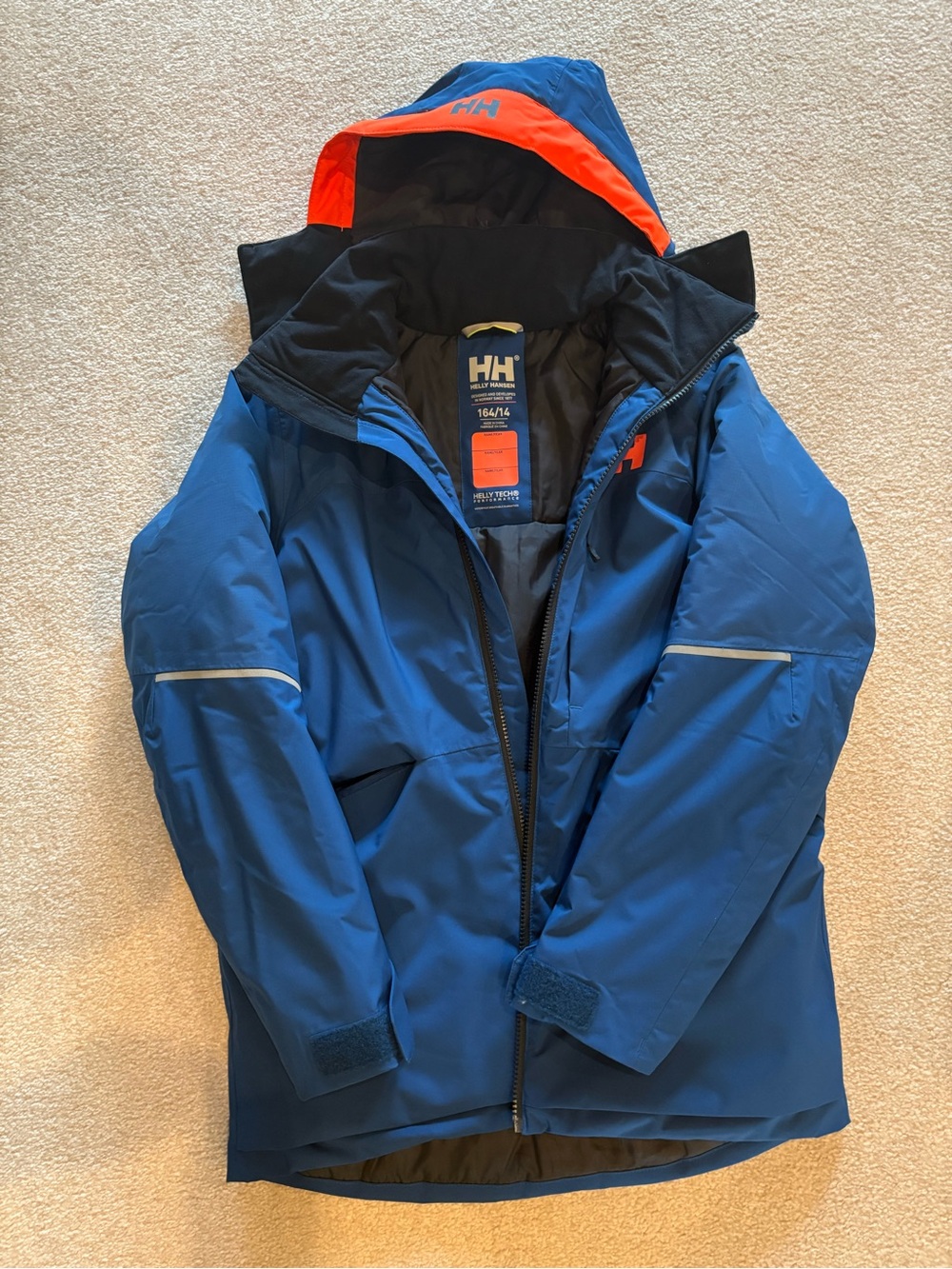 Helly Hansen Blue Ski Jacket with Orange Hood Trim